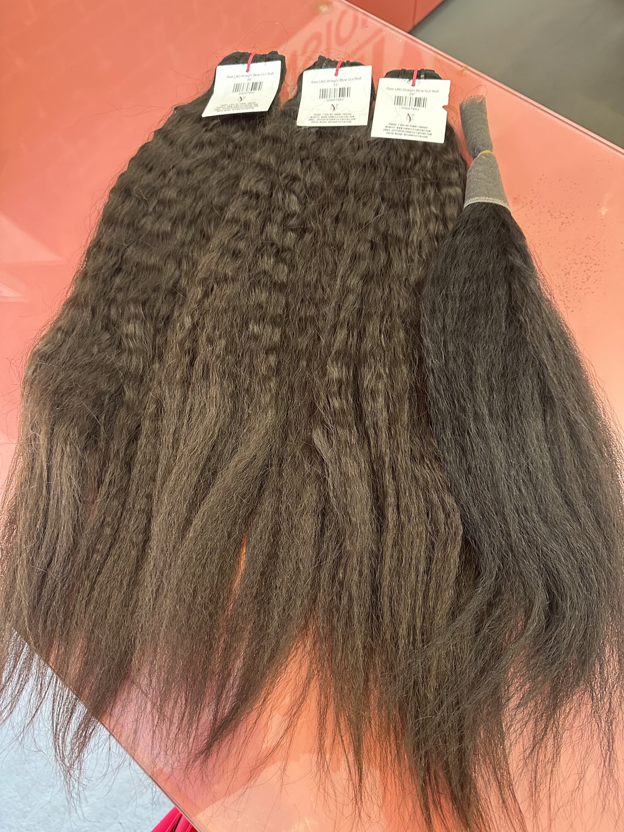 The Yummy Raw Lao Straight Blowout Weft bundles and closure.