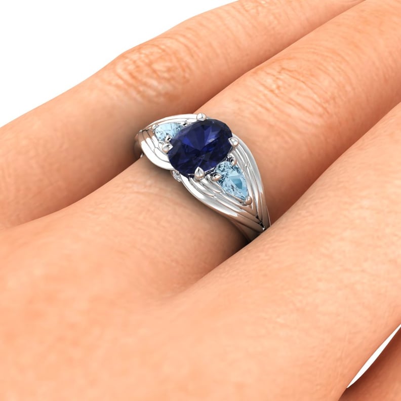 Rowena Raven's Wing Engagement Ring With Iolite, Aquamarine, and Canadian Diamonds