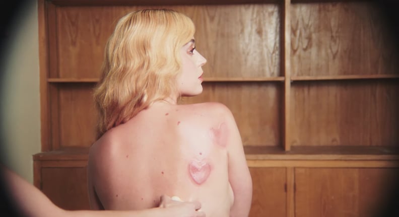 Cupping in the "Never Really Over" Music Video