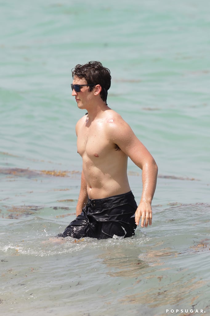 Miles Teller and His Girlfriend on the Beach in Miami
