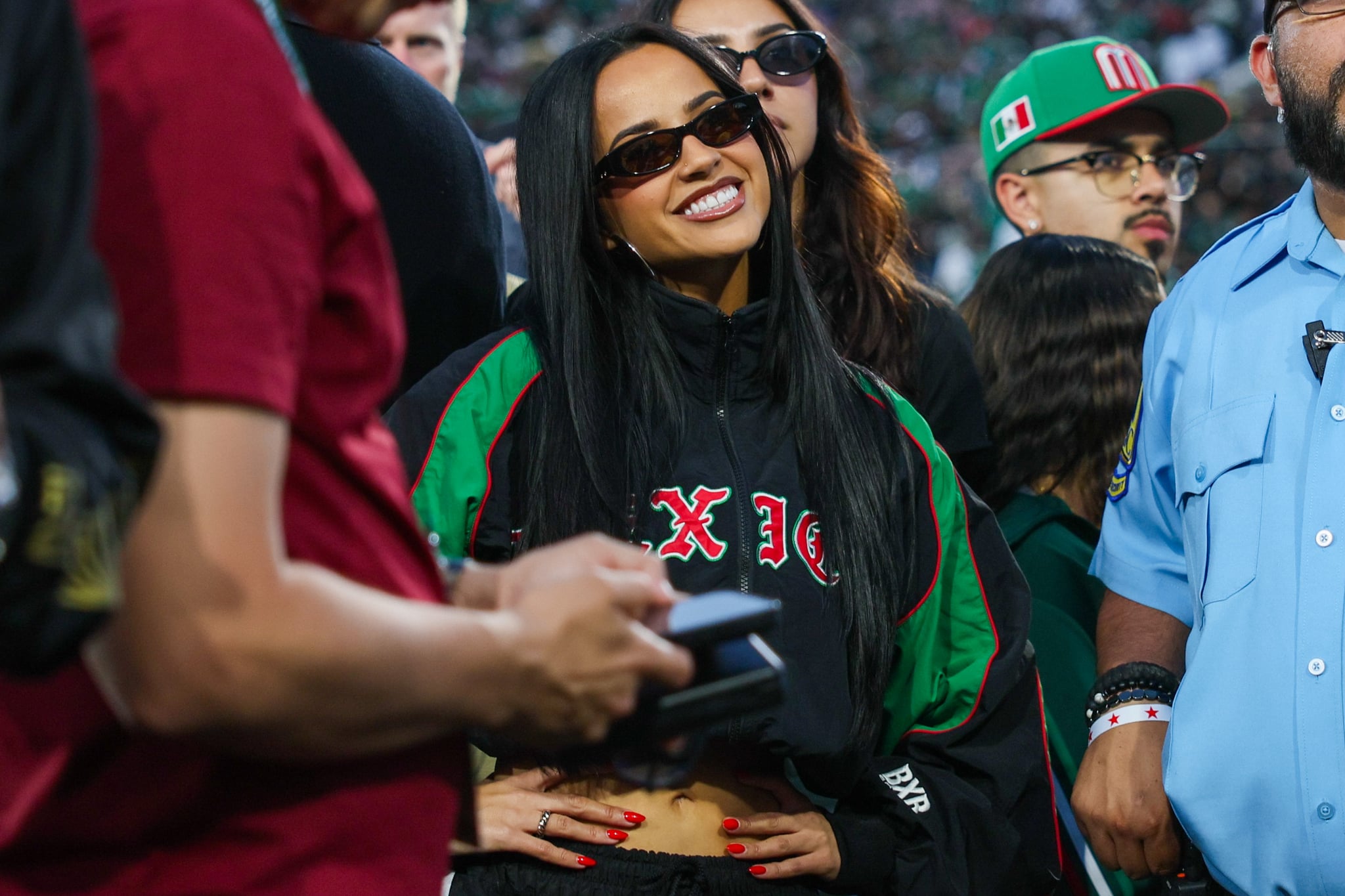 Pasadena, CA - May 30: Mexican-American and Los Angeles native recording artist Becky G smiles to the crowd during an international friendly game between Mexico vs Australia at the Rose Bowl in Pasadena, CA, Saturday, May 30, 2026. (Ronaldo Bolaños / Los Angeles Times via Getty Images)