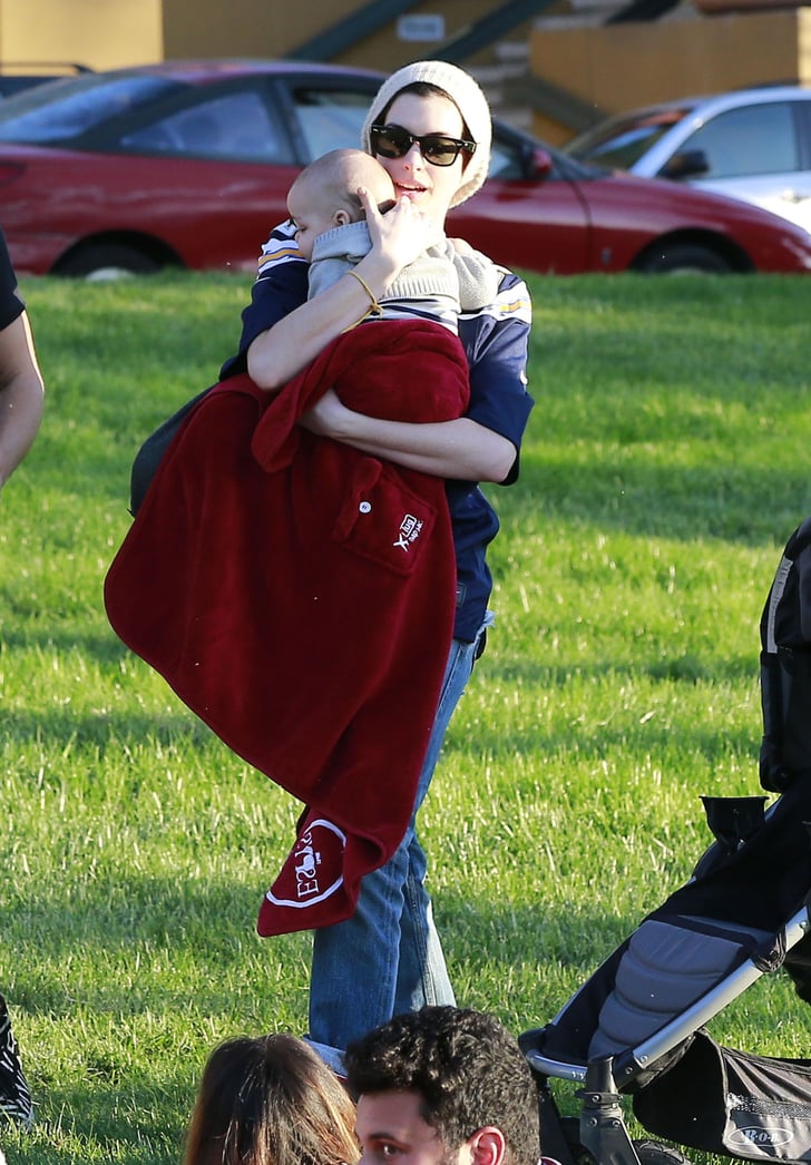 Anne Hathaway Holding A Baby At The Park In La Popsugar