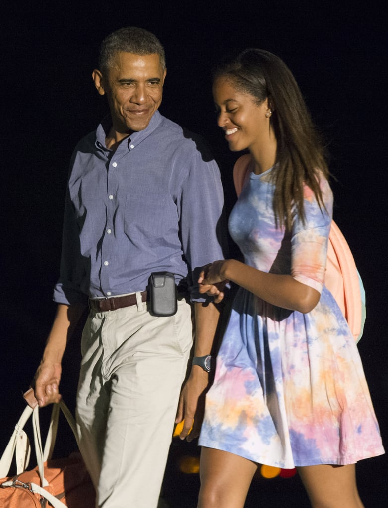 Malia laughed alongsider her dad when they returned from their trip to Martha's Vineyard in August.