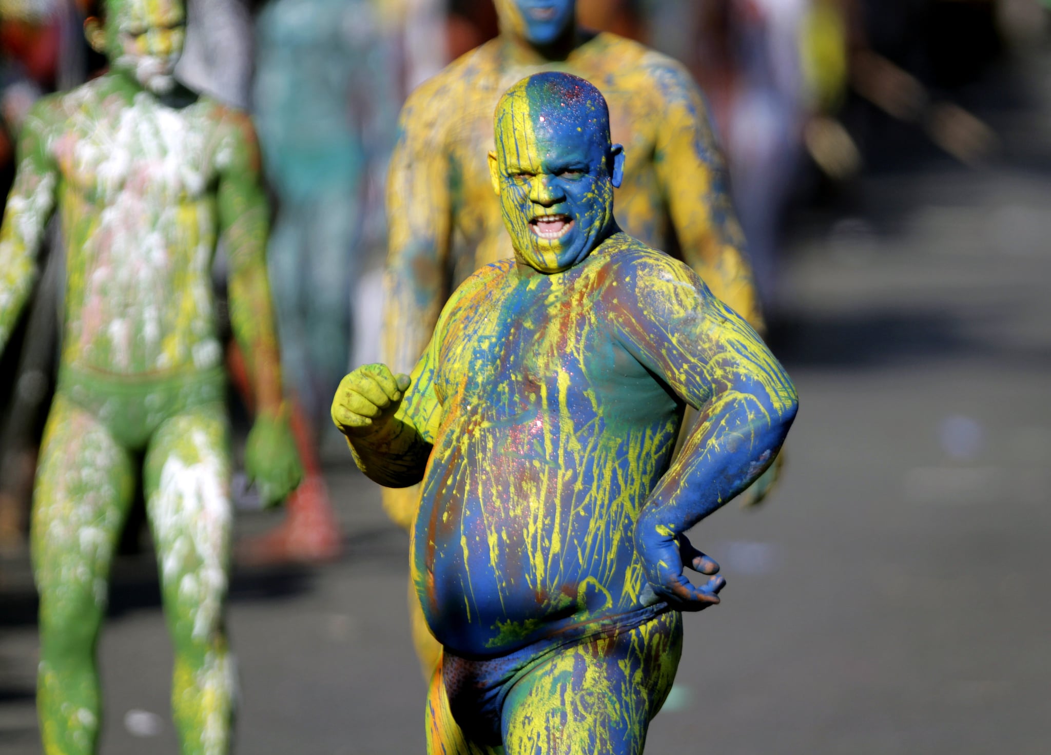 Revelers perform during a carnival parade in Santo Domingo on March 4, 2012. AFP PHOTO / ERIKA SANTELICES (Photo credit should read ERIKA SANTELICES/AFP via Getty Images)