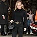 Miley Cyrus Wearing All Black With Gucci Pants in London