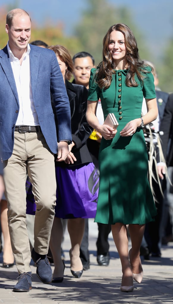 Kate joined Prince William on a visit to Kelowna University wearing an emerald Dolce & Gabbana dress with a row of buttons down the bodice and a ribbon bow at the neckline.
