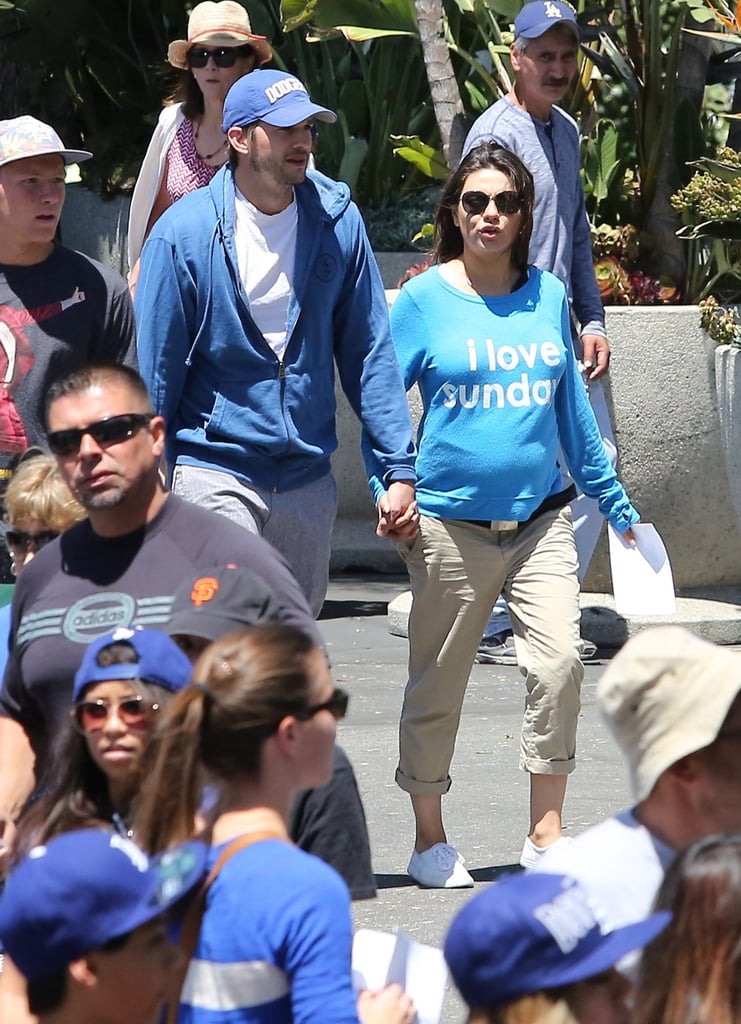 Ashton Kutcher and Mila Kunis at a Dodgers Game