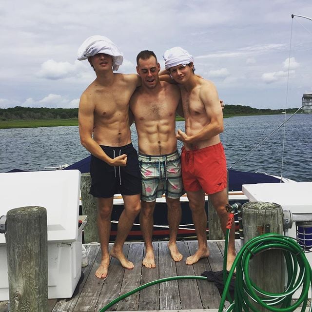 Ansel Elgort posed with his cute brother, Warren, and a friend in this lakeside photo, captioned, "Happy 4th from the Elgorts, and @matiasdelcastillo American Navy Officer (that's why he has the best abs)."