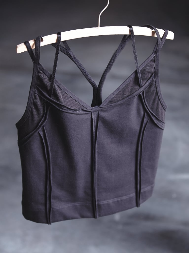 She isn't afraid to show off her rock-hard abs, which is why this Free People Movement Namaste Crop Cami ($68) is the top she needs to pack for barre class.