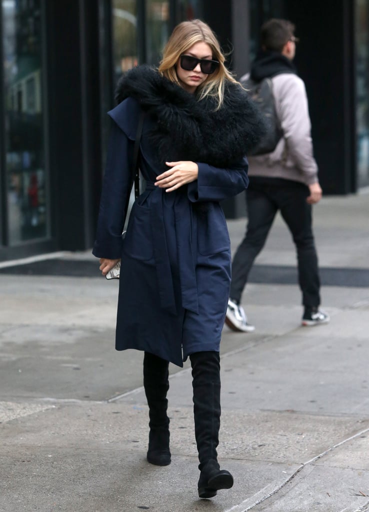 She accessorized her comfy coat with Karen Walker's Deep Worship sunglasses, and a Rag & Bone circle purse.