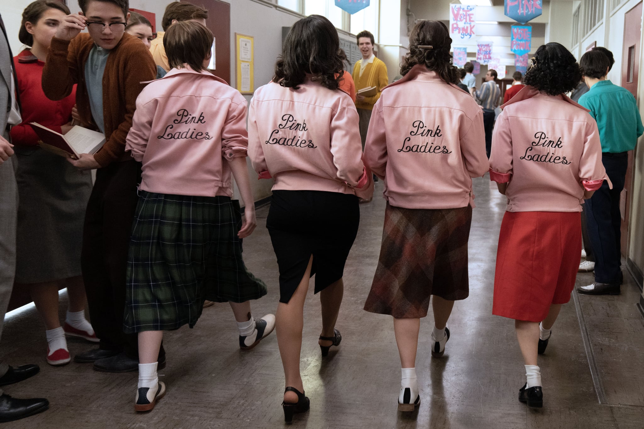 Tricia Fukuhara as Nancy Nakagawa, Marisa Davila as Jane Facciano, Cheyenne Wells as Olivia Valdovinos and Ari Notartomaso as Cynthia Zdunowski in Grease: Rise of the Pink Ladies 