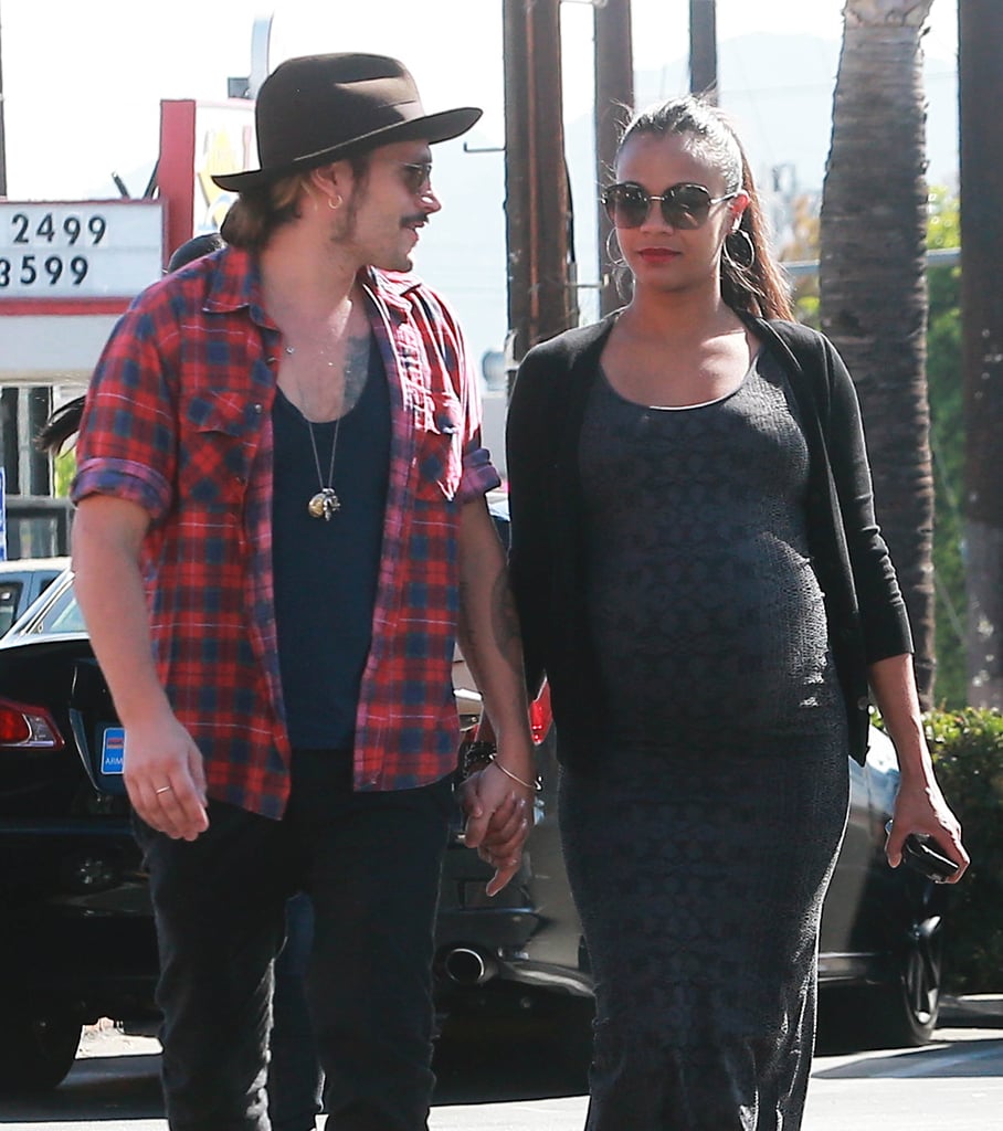 Zoe Saldana's baby bump was on display during her stroll with husband Marco Perego in LA on Sunday.