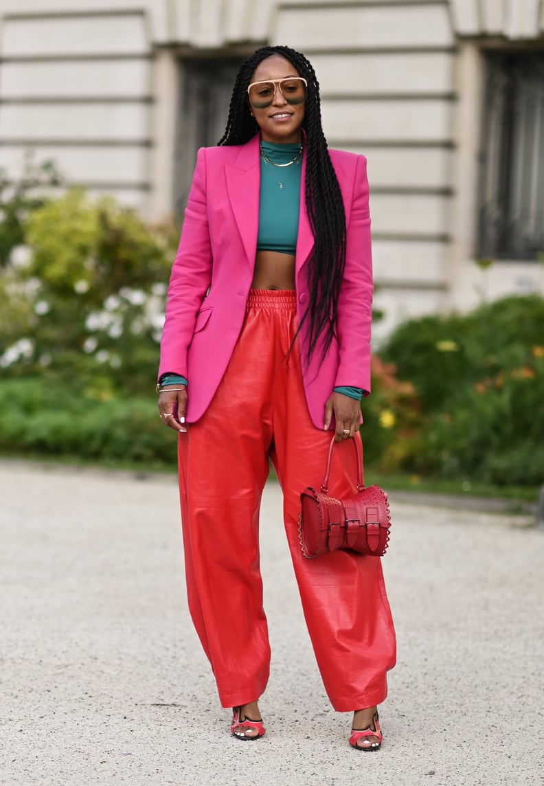 Rock Red Leather Pants With a Pink Blazer and a Green Crop Top