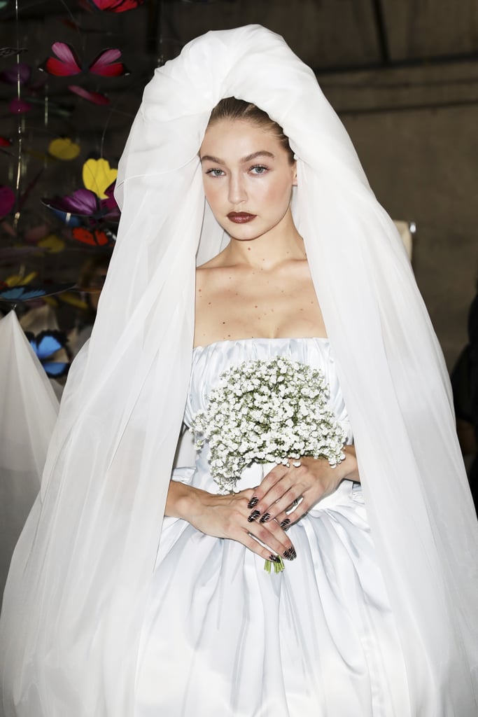 Gigi Hadid as a Bride in Moschino's Spring / Summer 2019 Show