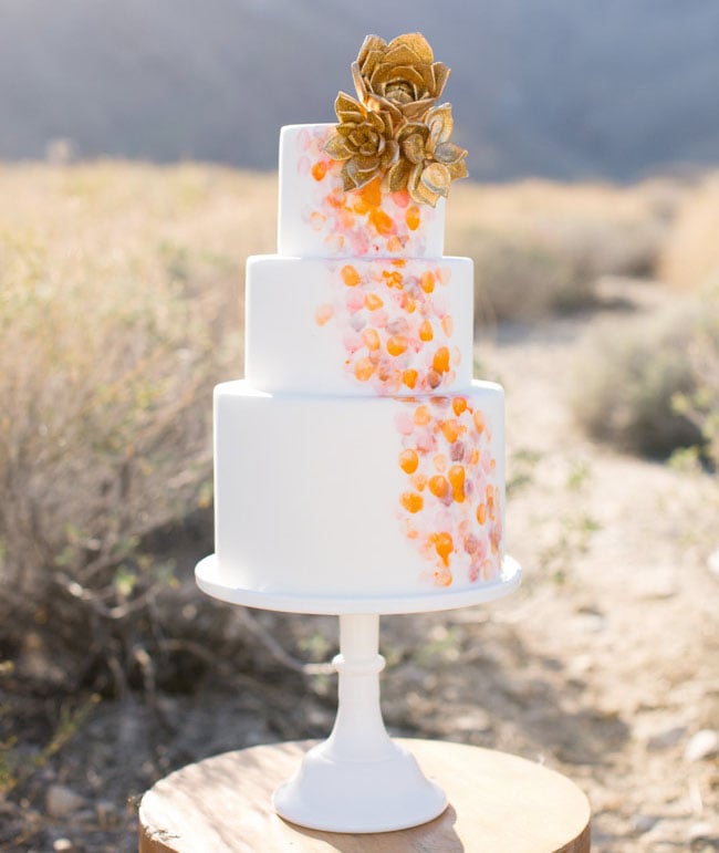 Gold succulents (yes, you read that right) top off this amazing and unique wedding cake. 
Photo by Birds of a Feather via Green Wedding Shoes
