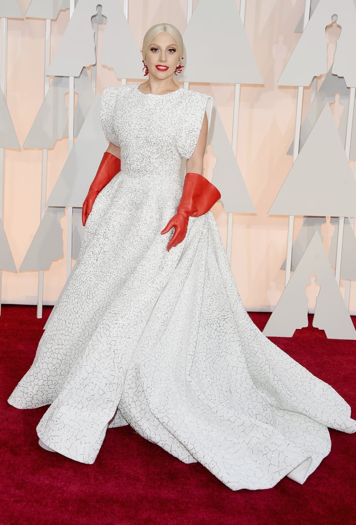 For the 2015 Oscars, Lady Gaga wore an Azzedine Alaïa dress with red leather gloves.
