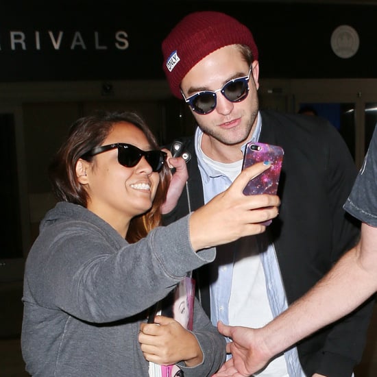 Robert Pattinson Takes a Selfie With a Fan | Photos