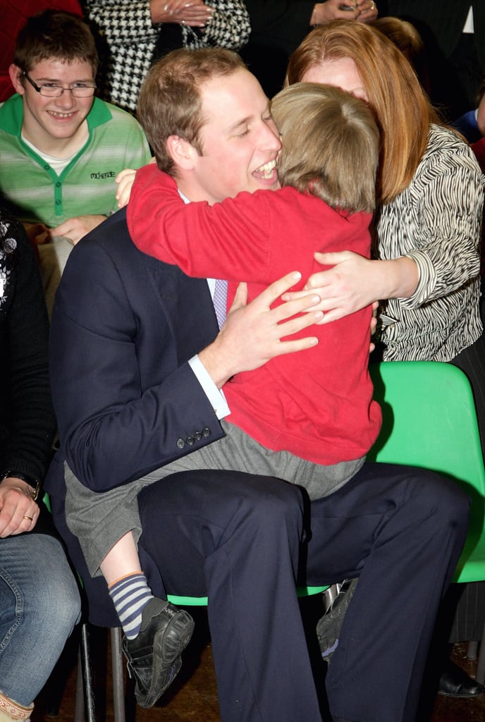 During a January 2010 visit to the Eresby School in England, Prince William was embraced by a little boy name Darren Pearty. Check out that bear hug!