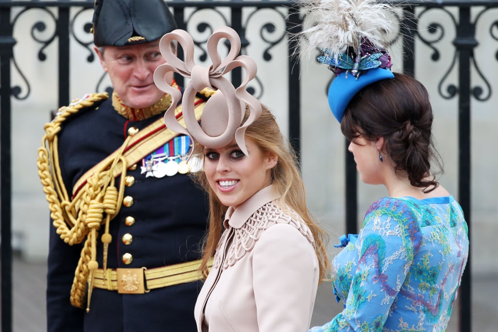 At the wedding of Prince William and Kate Middleton in 2011, wearing the hat that launched a thousand memes.