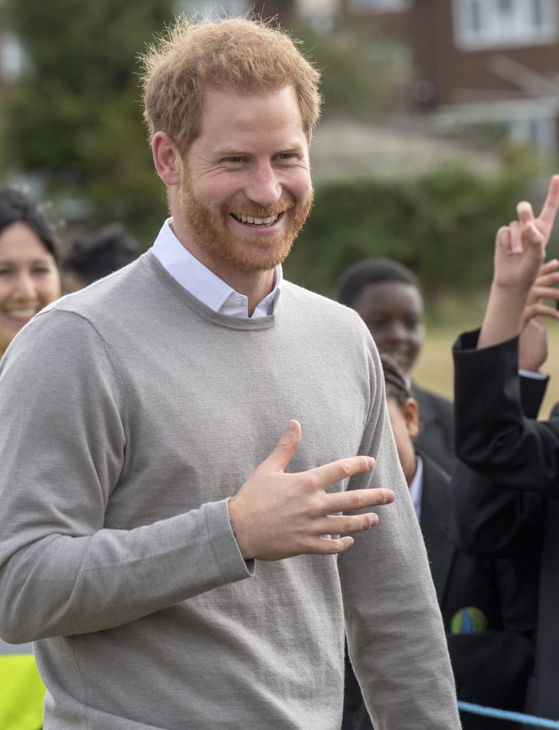 Prince Harry Hugs Kids at Lealands High School