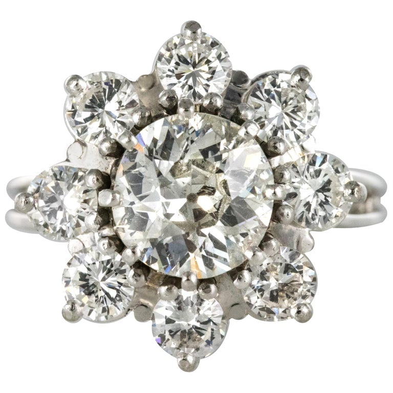 1stdibs French 1970s Retro 18 Karat White Gold Platinum Diamond Cluster Ring