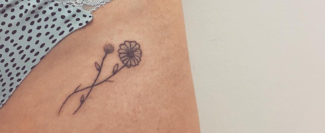 lotus flower on hip tattooTikTok Search