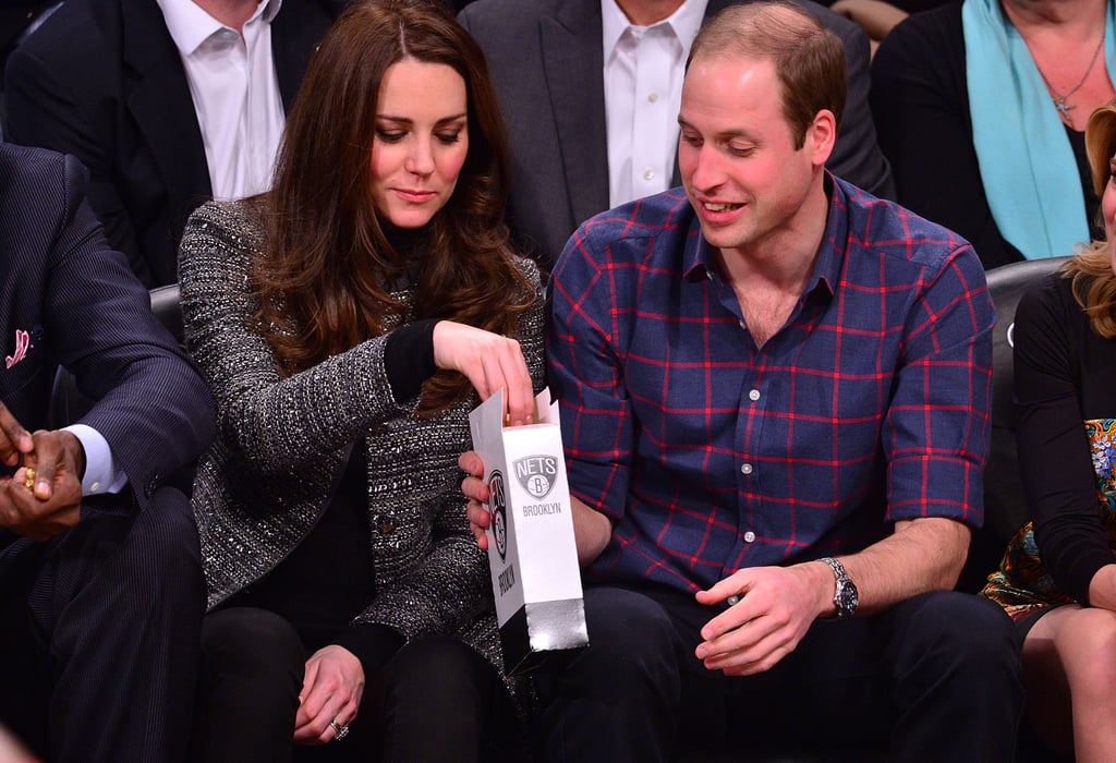 The couple shared a bag of popcorn during a Brooklyn Nets game in December.