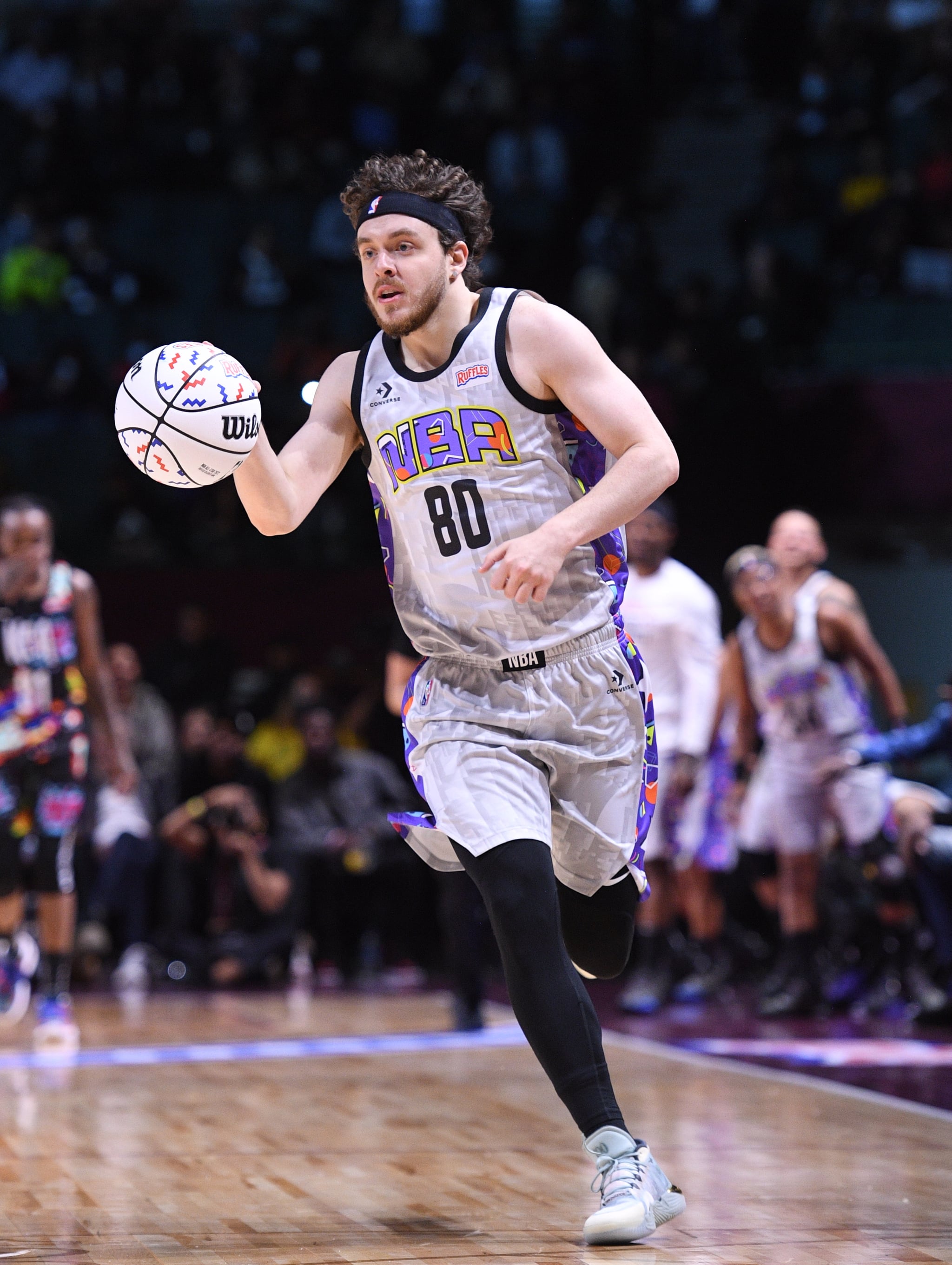 CLEVELAND, OH - FEBRUARY 18: Jack Harlow of Team Nique dribbles the ball during the Ruffles NBA All-Star Celebrity Game as part of 2022 NBA All Star Weekend on Friday, February 18, 2022 at Wolstein Centre in Cleveland, Ohio. NOTE TO USER: User expressly acknowledges and agrees that, by downloading and/or using this Photograph, user is consenting to the terms and conditions of the Getty Images Licence Agreement. Mandatory Copyright Notice: Copyright 2022 NBAE (Photo by Chris Schwegler/NBAE via Getty Images)
