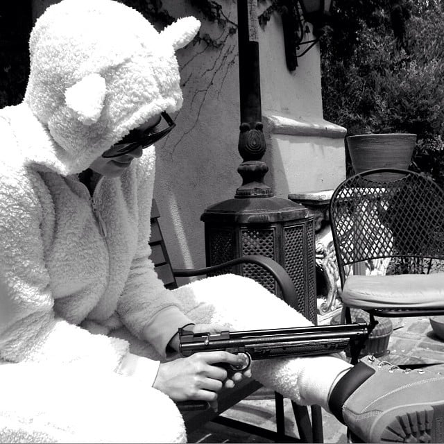 Khloé Kardashian wore this crazy animal suit and held a gun.
Source: Instagram user khloekardashian