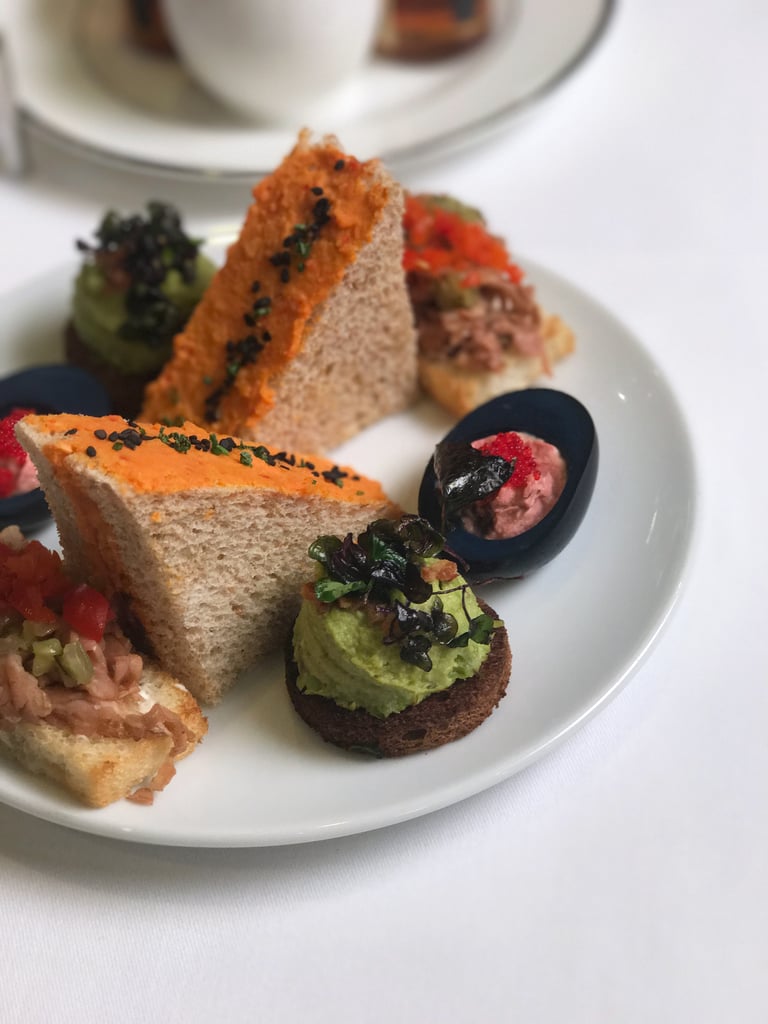 There's obviously a Maleficent-inspired snack on the villain-centric menu. It's the green one with "horns": toasted pumpernickel bread with an edamame-avocado smash, sweet chili, bacon, and fried ruby red, a type of microgreen.