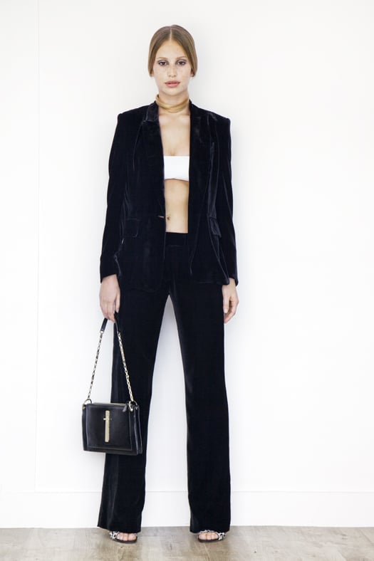 Leather Bandeau in Cream, Classic Velvet Blazer Jacket in Black, Classic Velvet Trouser in Black, Wild Night Pony Sandal in Grey Leopard, Attraction Patent Shoulder Bag in Black.
Photo courtesy of Tamara Mellon
Leather Bandeau in Cream, Classic Velvet Blazer Jacket in Black, Classic Velvet Trouser in Black, Wild Night Pony Sandal in Grey Leopard, Attraction Patent Shoulder Bag in Black.
Photo courtesy of Tamara Mellon
