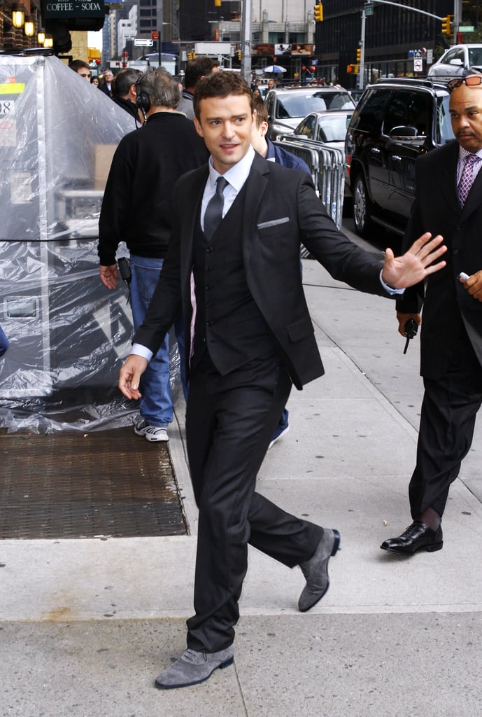 Justin hurried onto the set of Late Show With David Letterman in a button-down look in 2011.