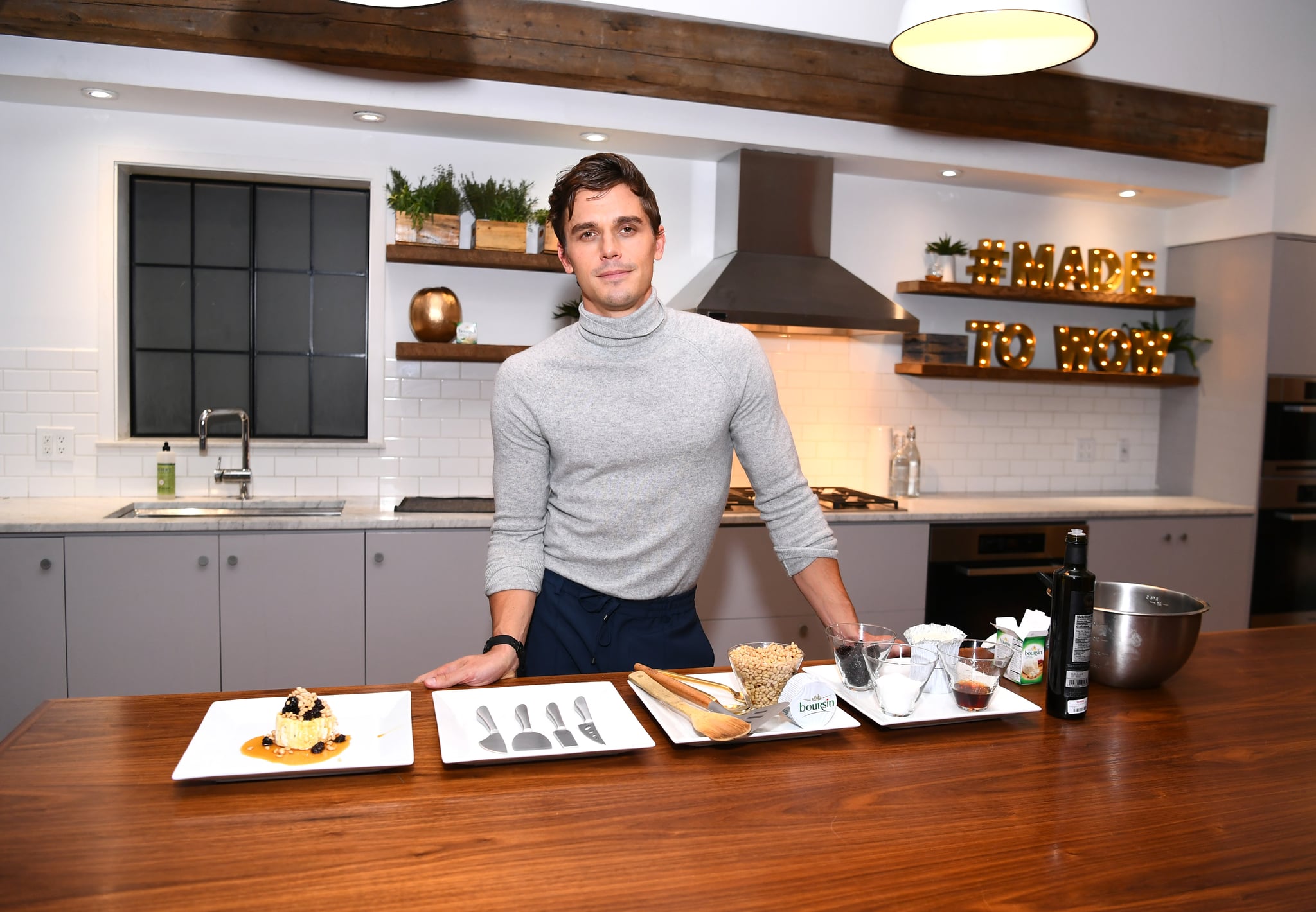 NEW YORK, NY - NOVEMBER 07:  Antoni Porowski demonstrates preparing a signature dish as he attends Boursin Friendsgiving at Home Studios on November 7, 2018 in New York City.  (Photo by Dave Kotinsky/Getty Images for Boursin Cheese)