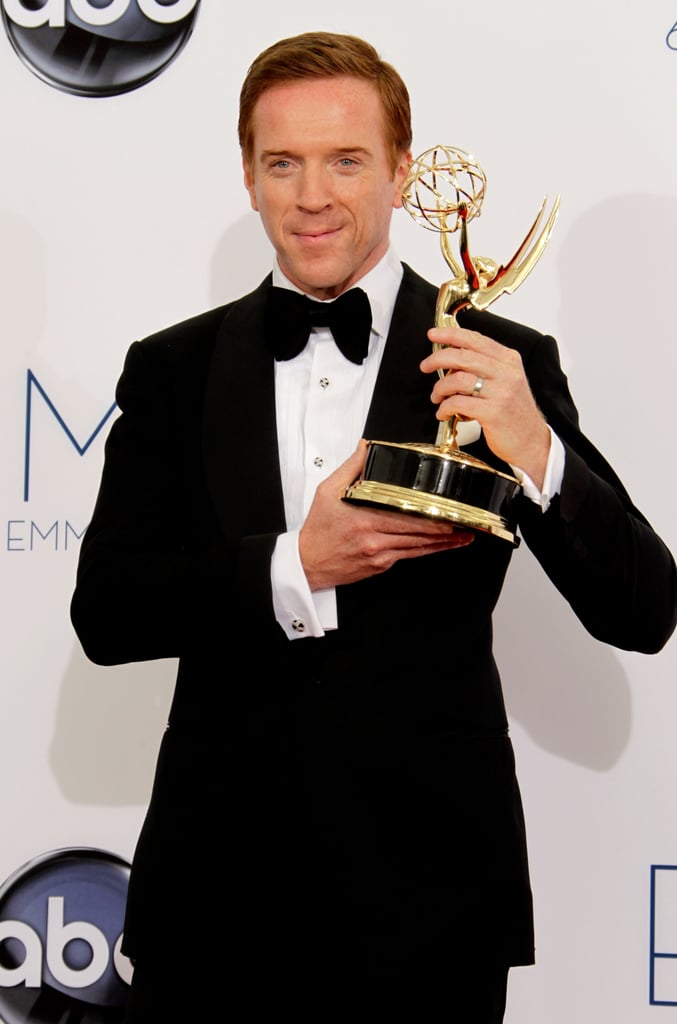 Homeland's Damian Lewis held up his Emmy after the show ...