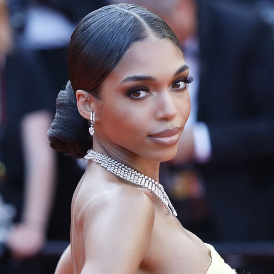 Lori Harvey Styles a White Bra With a Vintage Leopard Skirt