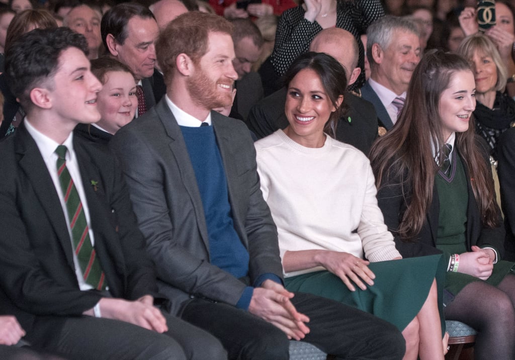 Meghan Markle Looking at Prince Harry Pictures