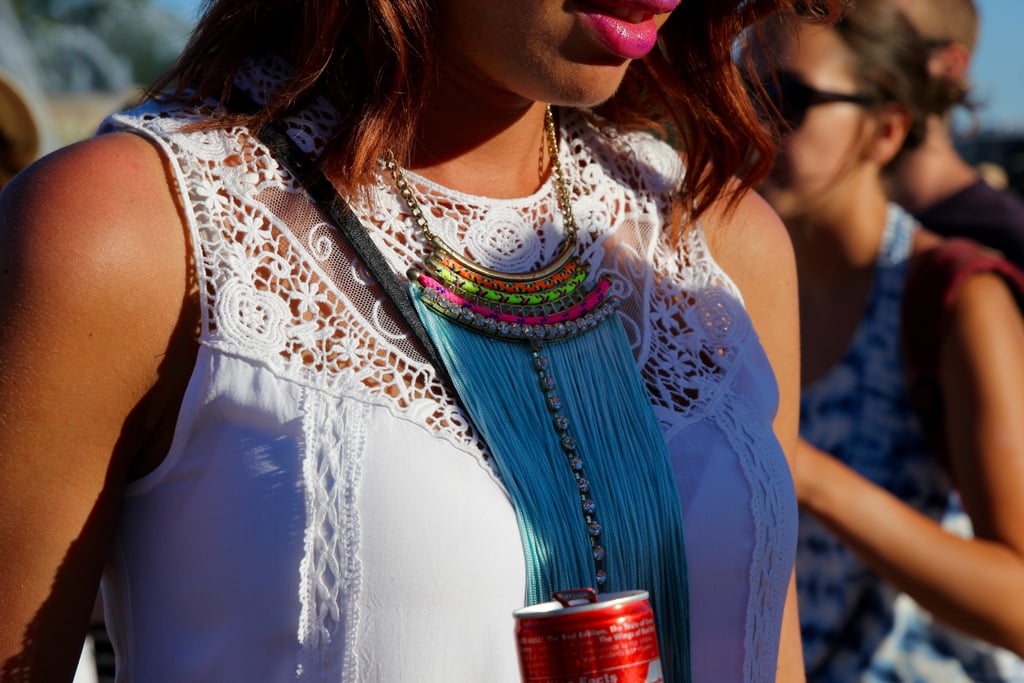 We love how this Lollapalooza attendee dared to mix a lace fabric with a more modern, neon statement necklace.
