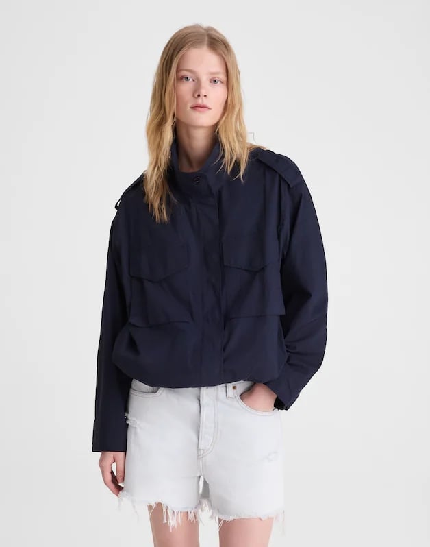 Madewell Field Jacket in Washed Poplin ($80, originally $148)
Adding light, airy layers is the name of the game when it comes to dressing for early fall. This oversize poplin jacket is lightweight, full of utilitarian details, and comes in two classic seasonal colors — navy and beige.