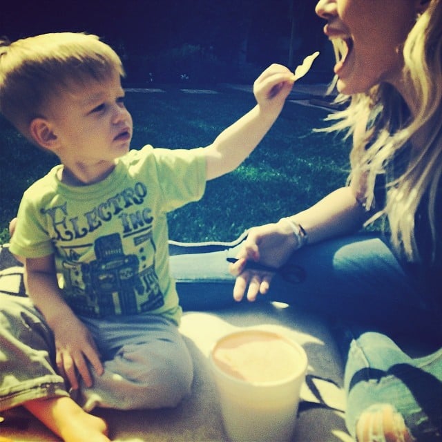 Luca Comrie turned the table around on his mom, Hilary Duff, and fed her some chips.
Source: Instagram user hilaryduff