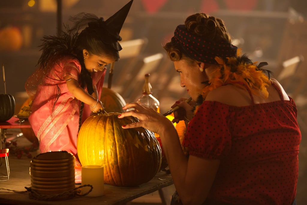 She and Amazon Eve (Erika Ervin) carve pumpkins together.
