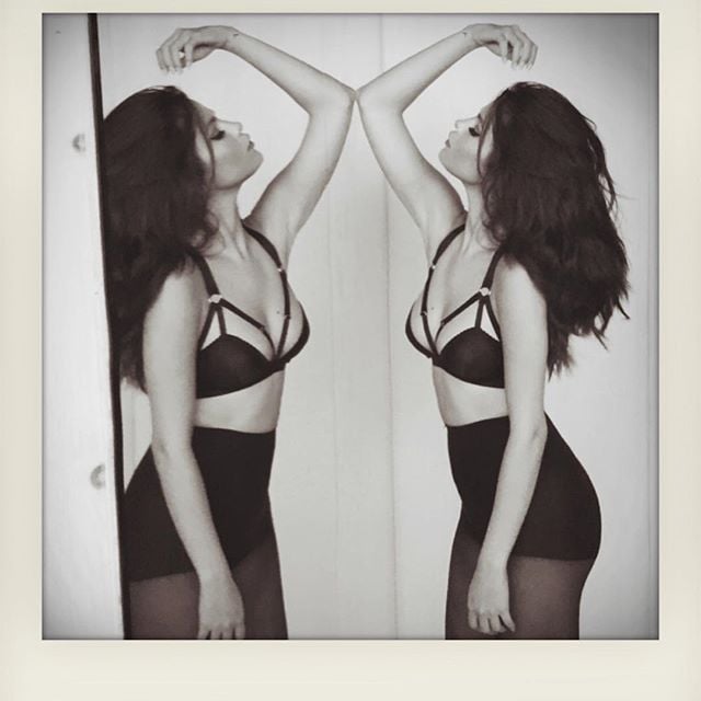 This artistic picture of Selena in a bra and short shorts helped promote her new album.