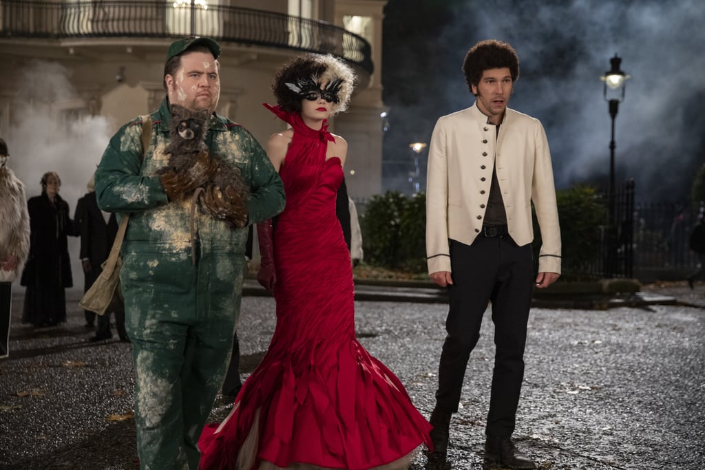 Paul Walter Hauser as Horace, Emma Stone as Cruella, and Joel Fry as Jasper