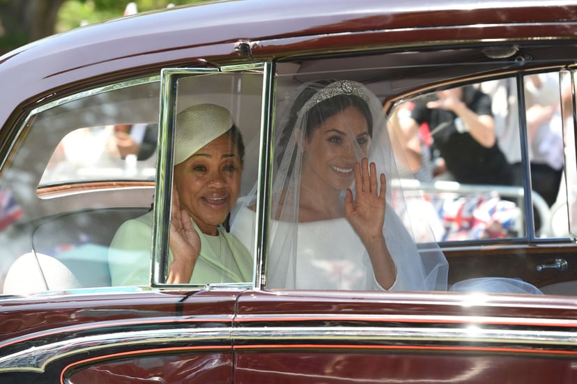 Meghan Markle (R) and her mother, Doria Ragland, arrive for her wedding ceremony to marry Britain's Prince Harry, Duke of Sussex, at St George's Chapel, Windsor Castle, in Windsor, on May 19, 2018. (Photo by Oli SCARFF / AFP)        (Photo credit should r