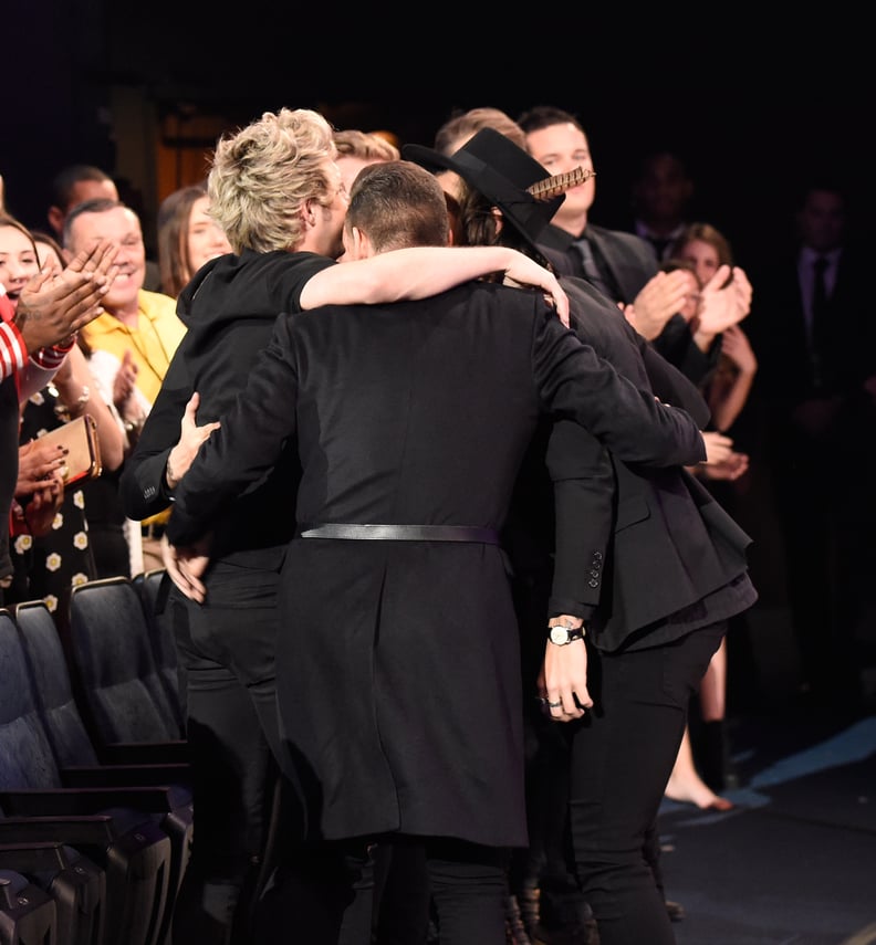 One Direction Celebrating Their Win at the American Music Awards in 2014