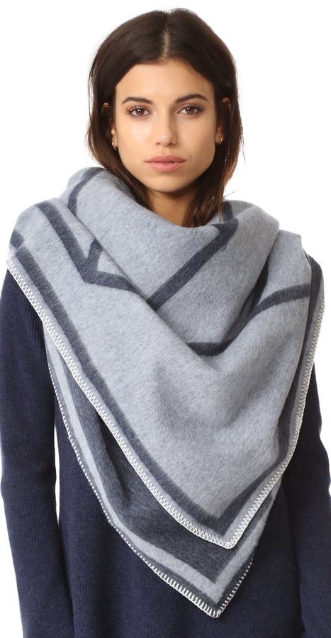 "My mom taught me tons of cold-weather style lessons I still follow today, such as never going outside without a scarf. This year, I'll be bundling up with Tory Burch's Fret Whipstitch Blanket Scarf ($350), which I'm planning on pairing with my trustiest leather jacket." — SS