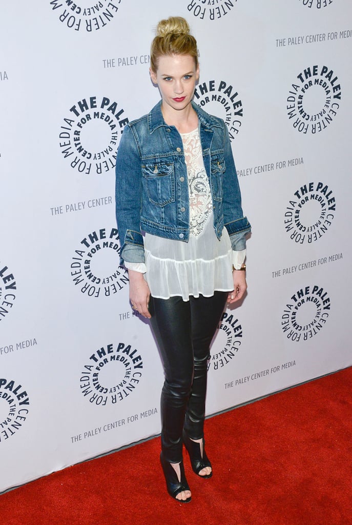 January Jones took a casual red carpet approach in a cropped denim jacket, which she wore over a white sheer blouse, black leather pants, and black peep-toe booties.