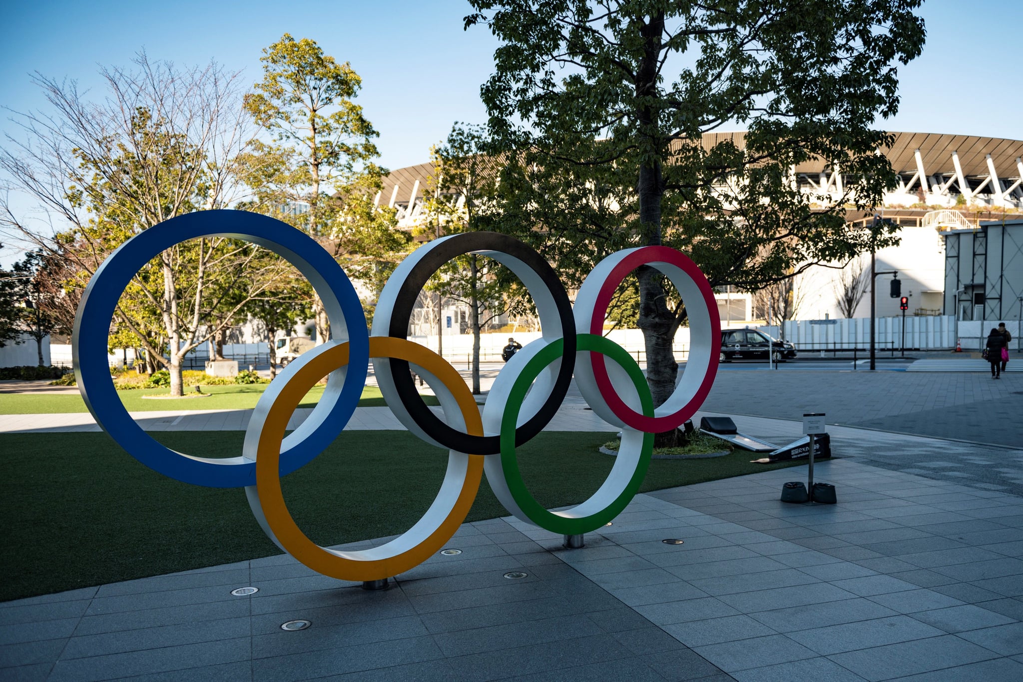 This picture taken on January 20, 2021 shows the Olympic rings outside the Olympic Museum in Tokyo. - When the Tokyo Olympics were postponed last year, officials promised they would open in 2021 as proof of humankind's triumph over the coronavirus. But six months before the delayed start, victory over the virus remains distant, and fears are growing rapidly that the Games of the 32nd Olympiad may not happen at all. (Photo by Philip FONG / AFP) / TO GO WITH AFP STORY OLY-2020-2021-JAPAN-VIRUS-HEALTH BY ANDREW MCKIRDY (Photo by PHILIP FONG/AFP via Getty Images)
