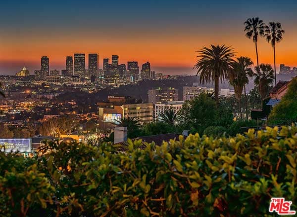 The four-bed, five-bath estate, which was built in 1938, was designed with the idea of fusing together indoor/outdoor living, which is why many of the rooms open up to beautiful views of the Hollywood Hills, along with lush gardens and a Zen pool. (We bet Nick loves to get his "Namaste" on.)