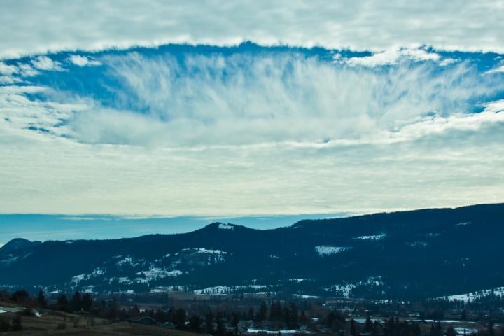 A closer look at the fallstreak cloud emphasizes how huge the circular space is.