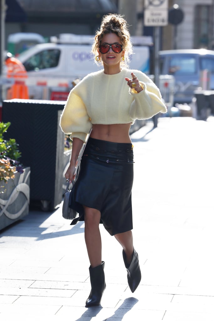 Rita Ora Wears an Ab-Baring Leather Midi Skirt